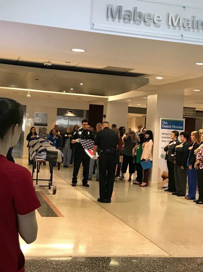 Hospital Staff Halts Work & Lines Up When Body Is Rolled Through The Doors