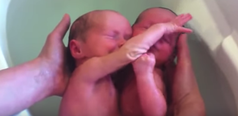 Newborn Twins Cling To Each Other, Think They Are Still In The Womb