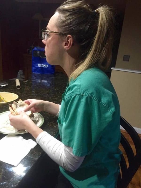 Husband spots wife eating by herself after 14 hour shift then writes a letter about her online