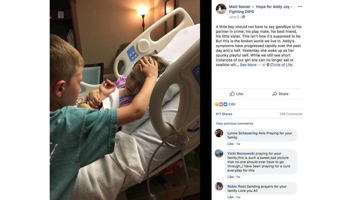 The story behind the heartbreaking picture of a 6-year-old boy saying goodbye to his dying sister