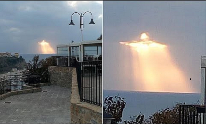Image of Jesus Shining through the Clouds during Sunset and Captured on Camera